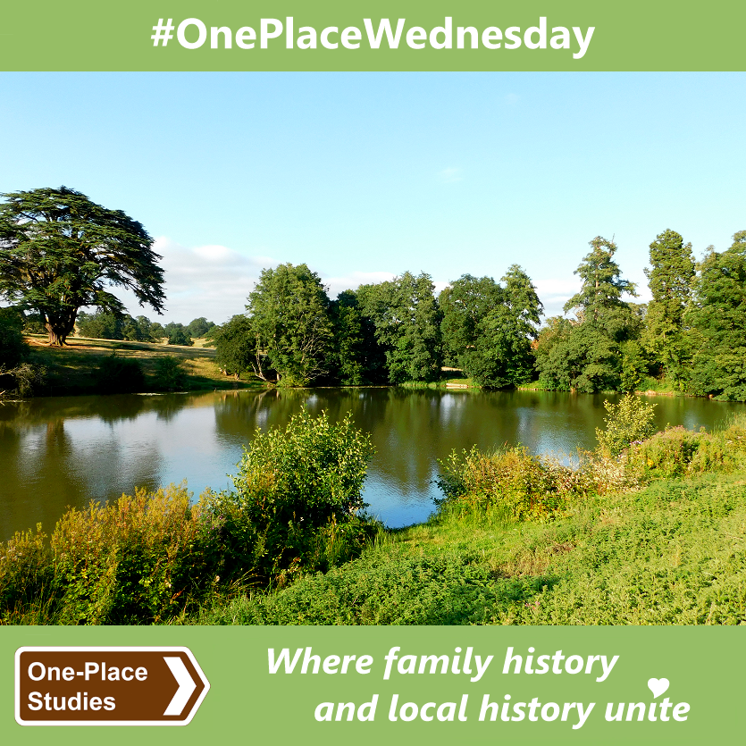 #OnePlaceWednesday. 
Image: A photo of a small lakesurrounded by greenery provided by grasses, herbage, shrubs and trees (including a large and majestic Cedar of Lebanon above the far shore, on the left side of the image), and with a blue, almost cloudless sky above. Trees and sky are reflected in the water. 
One-Place Studies, where family history and local history unite.