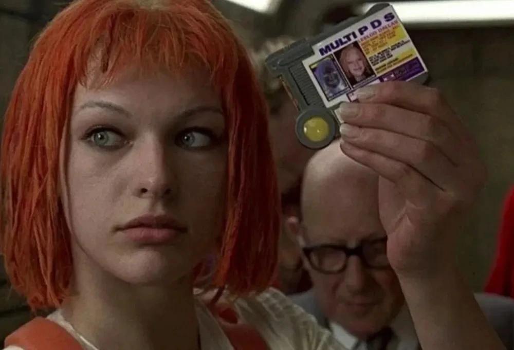 Leeloo from the movie The Fifth Element, holding up her "Multi Pass", but I've changed "MULTI PASS" to "MULTI PDS". Badly.